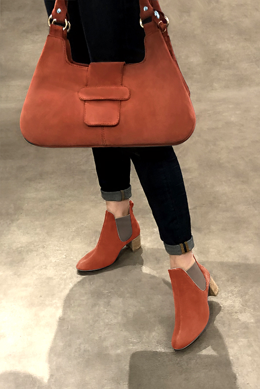 Terracotta orange and taupe brown women's ankle boots, with elastics. Round toe. Medium block heels. Worn view - Florence KOOIJMAN